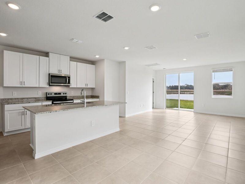 Furnished interior view inside a new home in Oakfield Trails - Premier Series, Parrish (Image 6).