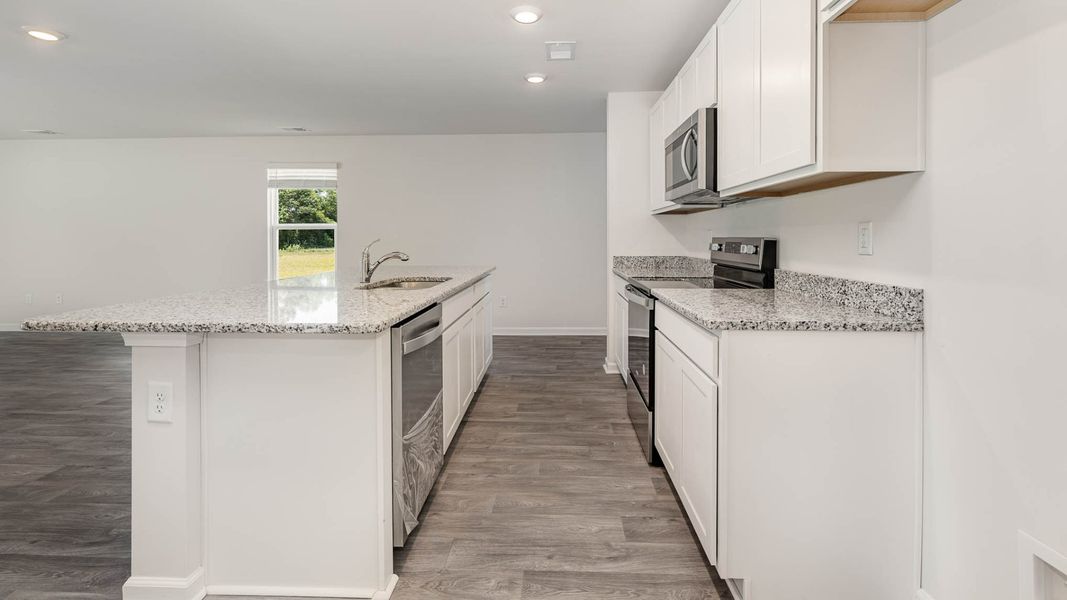 Representative furnished interior of a home built from the WREN by D.R. Horton in Cedar Hill Landing, Navassa (Image 5).