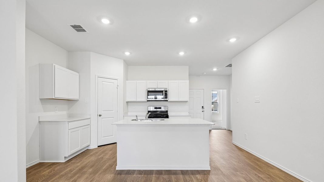 Furnished interior view inside a new home in Wayside, Uhland (Image 7).
