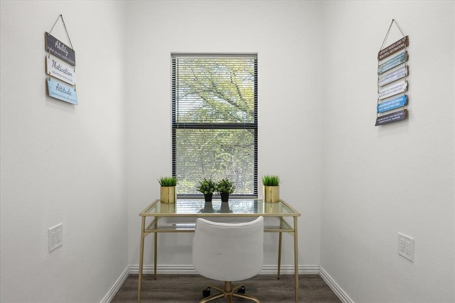 Office space featuring dark hardwood / wood-style floors