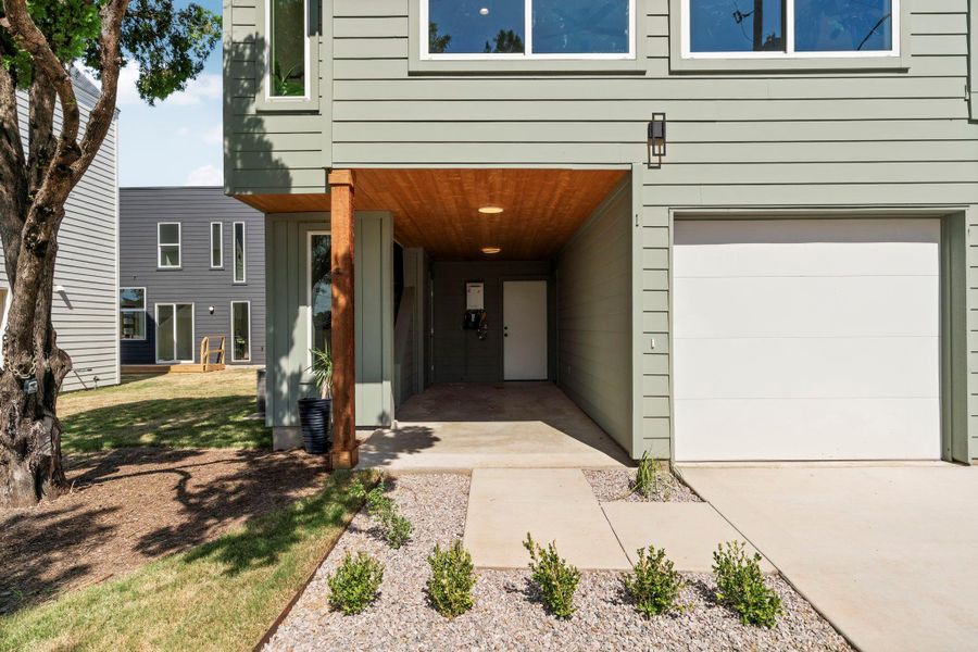 Property entrance featuring a garage