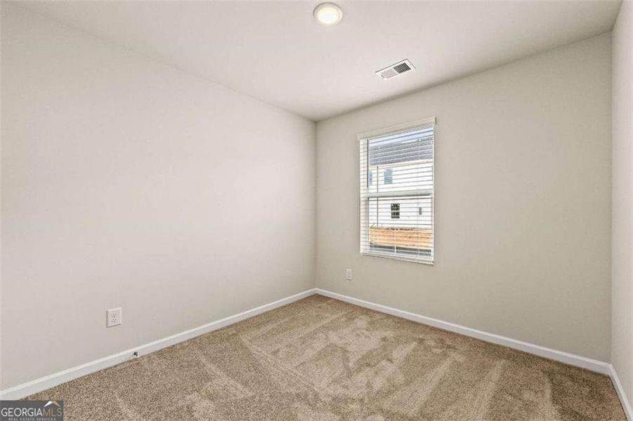 Spacious, unfurnished interior of a new home in The Grove At Mundy Mill, Gainesville (Image 16).