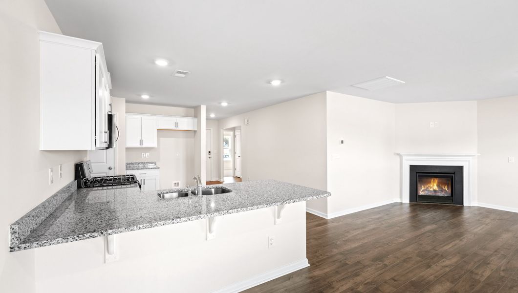 Representative furnished interior of a home built from the MACON by D.R. Horton in Harrier Point, Woodruff (Image 7).