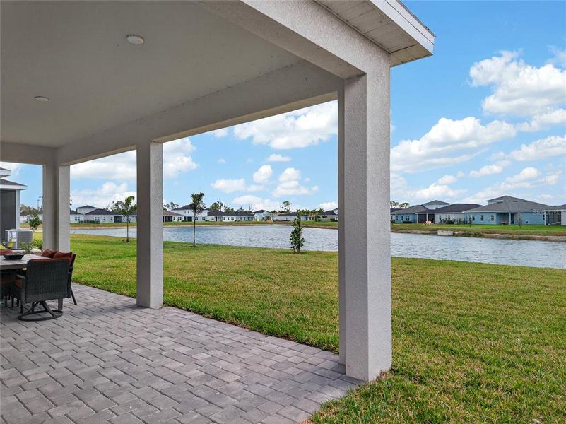 Exterior details and patio area of a home in West Port Single Family Homes, Port Charlotte (Image 21).