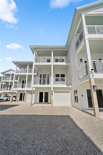 Front exterior of a new home in , Islamorada, Village of Islands, FL, highlighting curb appeal (Image 25).