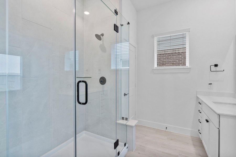 Furnished interior view inside a new home in Wildrye 45', Waller (Image 4).