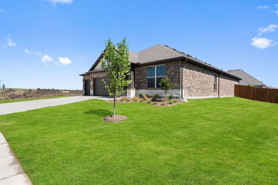 Front exterior of a new home in Waverly Estates, Nevada, TX, highlighting curb appeal (Image 53).