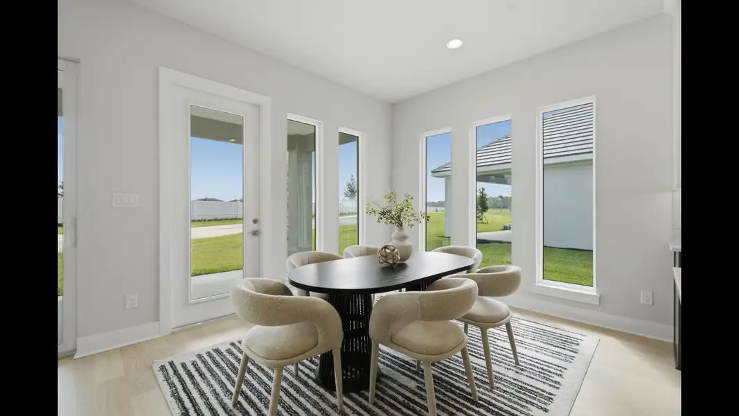 Representative furnished interior of a home built from the 2546F by Perry Homes in Sanctuary at Seaire, Parrish (Image 7).