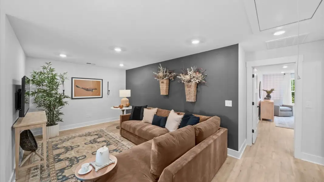 Furnished interior view inside a new home in Village at Midway, Anderson (Image 25).