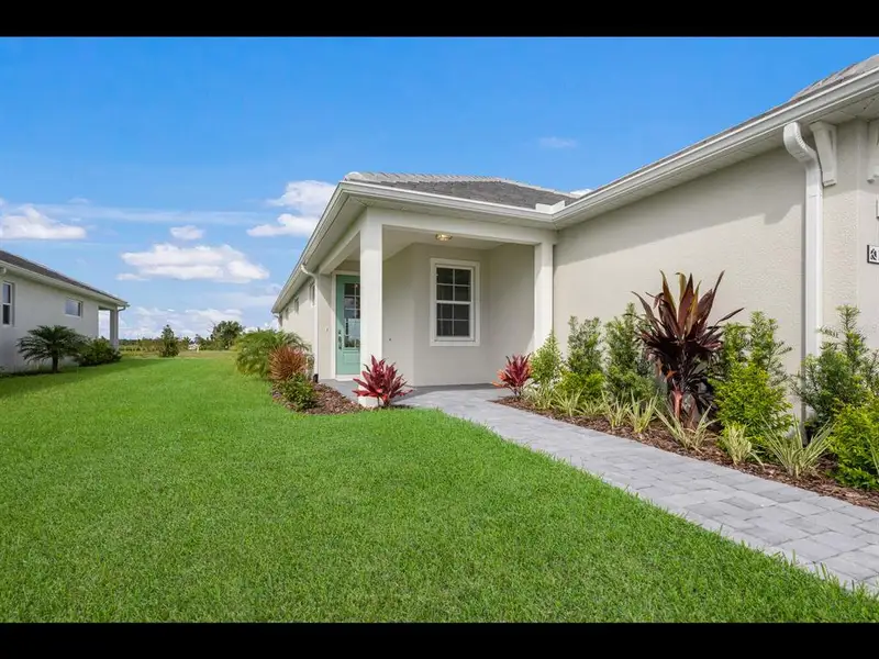 Exterior details and patio area of a home in , Sarasota (Image 24).