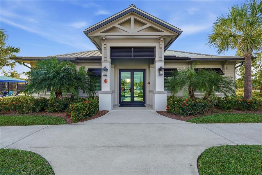 Front exterior of a new home in Heritage Landing, Punta Gorda, FL, highlighting curb appeal (Image 32).