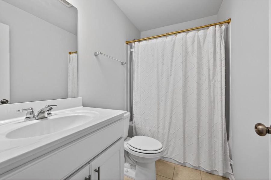 Furnished interior view inside a new home in Reunion, Flowery Branch (Image 11).