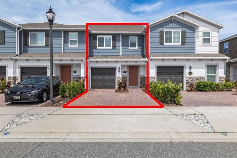 Front exterior of a new home in , Orlando, FL, highlighting curb appeal (Image 1). Front exterior of a new home in , Orlando, FL, highlighting curb appeal (Image 1).