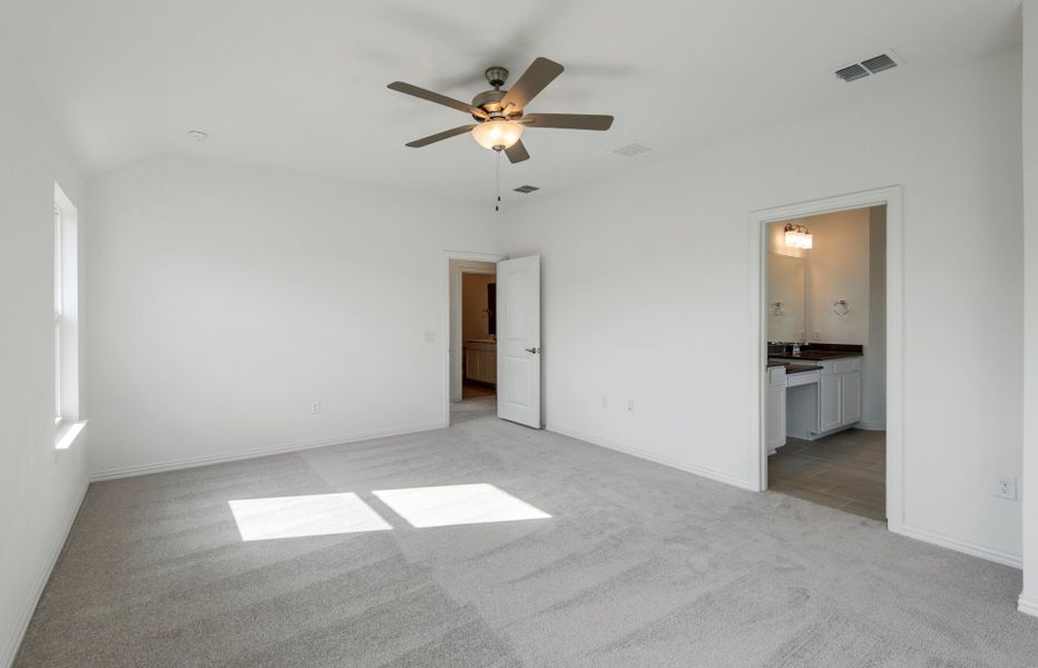 Spacious owner's suite with private bath