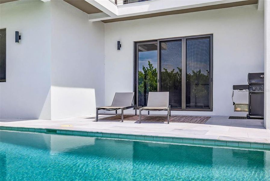 Exterior details and patio area of a home in , Redington Shores (Image 36).