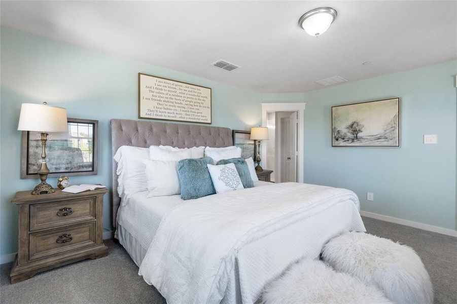 View of carpeted bedroom