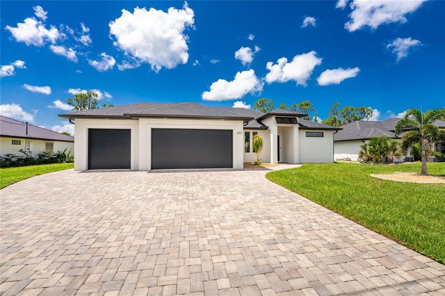 Front exterior of a new home in , Rotonda West, FL, highlighting curb appeal (Image 30).
