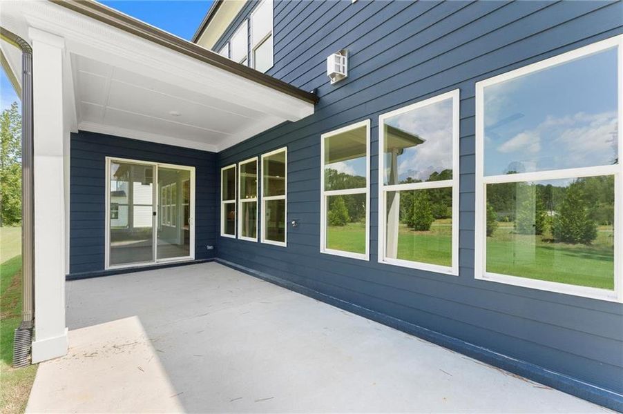 Exterior details and patio area of a home in Hillgrove Preserve, Powder Springs (Image 25).