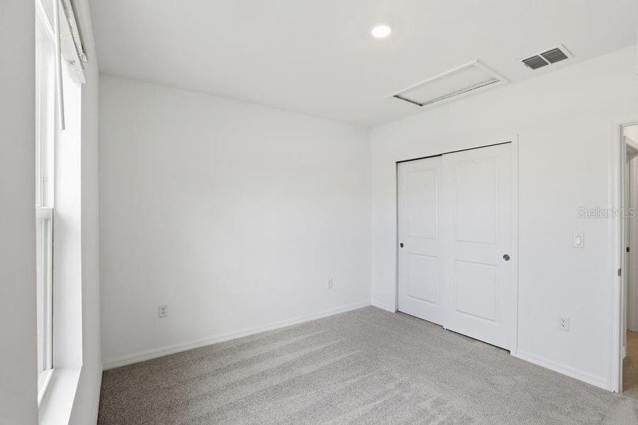 Spacious, unfurnished interior of a new home in Waterstone, Groveland (Image 20).