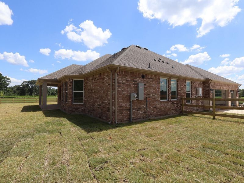 Exterior details and patio area of a home in Lone Star Landing, Montgomery (Image 4). Exterior details and patio area of a home in Lone Star Landing, Montgomery (Image 4).