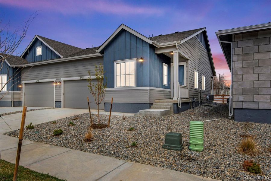 Front exterior of a new home in , Berthoud, CO, highlighting curb appeal (Image 25).