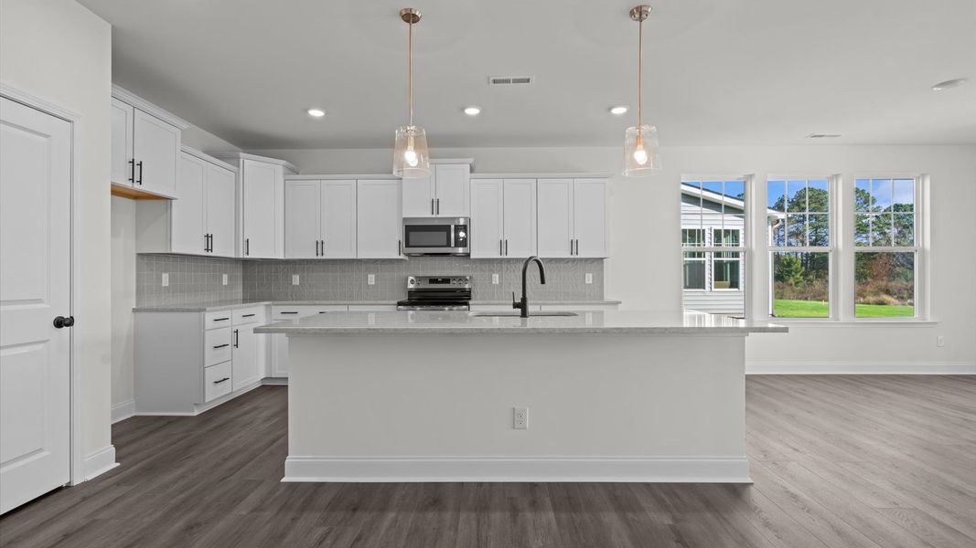 Representative furnished interior of a home built from the Ansley by DRB Homes in Sidney Creek Single Family, Zebulon (Image 10).