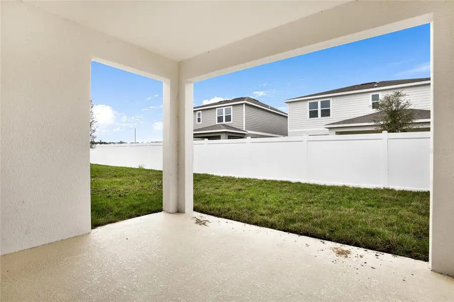 Exterior details and patio area of a home in , Tavares (Image 3).