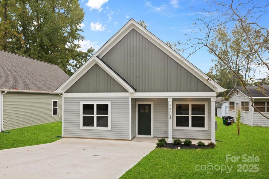 Front exterior of a new home in , Charlotte, NC, highlighting curb appeal (Image 24).