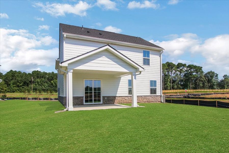 Exterior details and patio area of a home in Aspen Meadows, Hampton (Image 2).