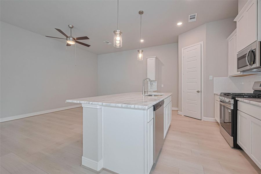 Furnished interior view inside a new home in Regents Court, Houston (Image 11).