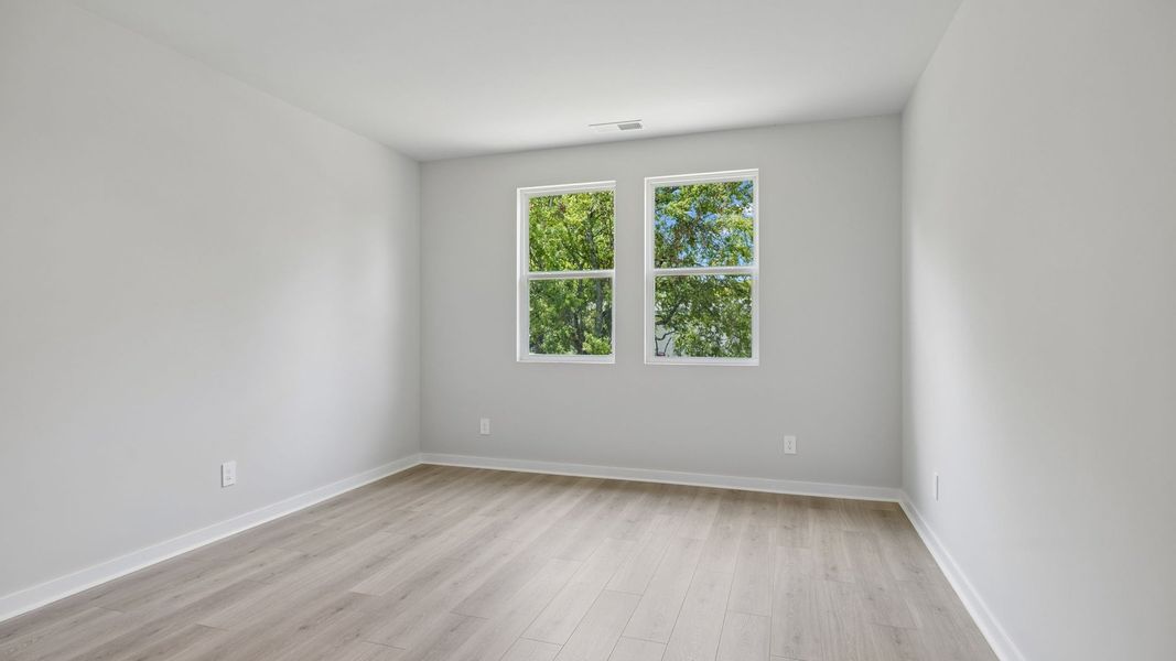 Representative unfurnished interior of a home built from the Ansley by D.R. Horton in Harvest Point, Spring Hill (Image 59).