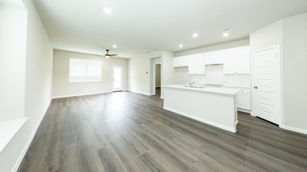 Dining Area to Kitchen and Family Room Dining Area to Kitchen and Family Room