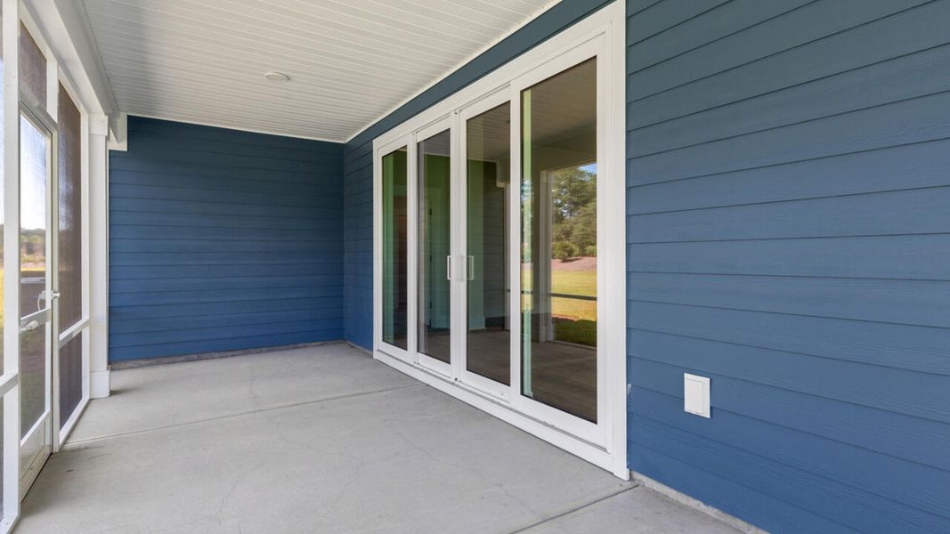 Exterior details and patio area of a home in The Haven at Indigo Preserve, Leland (Image 3).