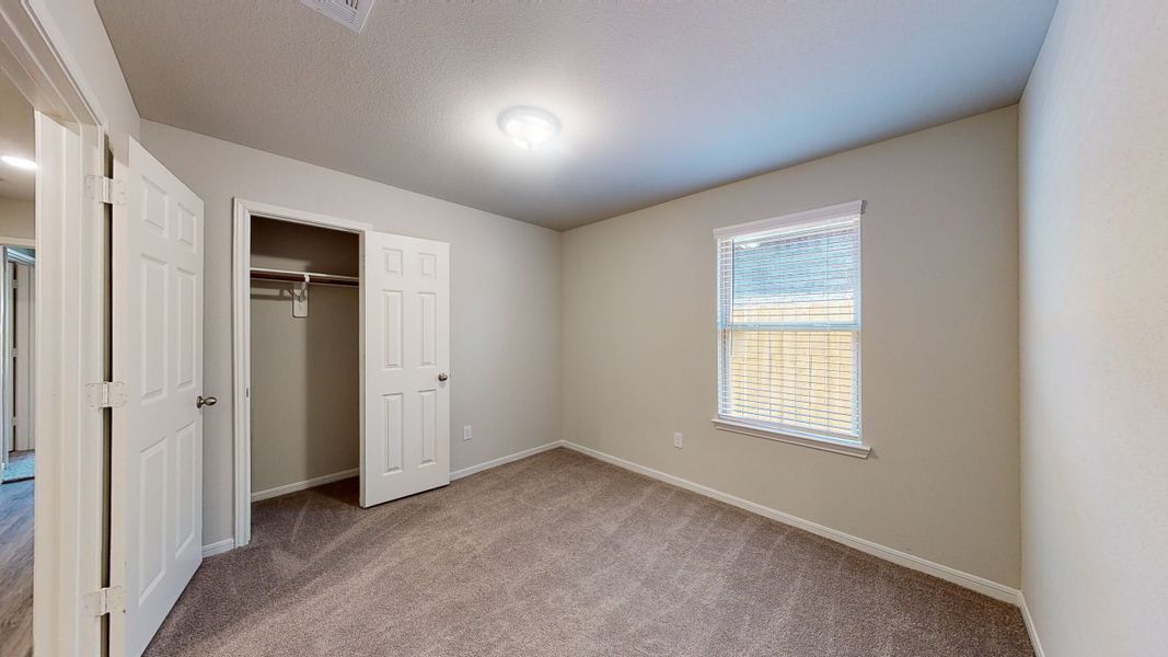 Representative unfurnished interior of a home built from the Floor Plan 1605 by Colina Homes in River Ranch, Dayton (Image 26).