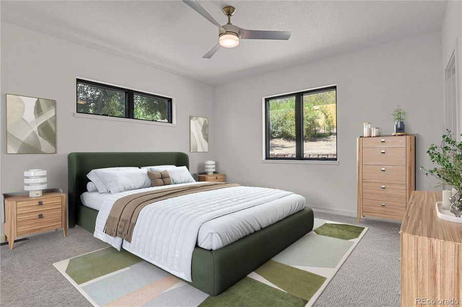 Main level primary suite. Virtually Staged Main level primary suite. Virtually Staged