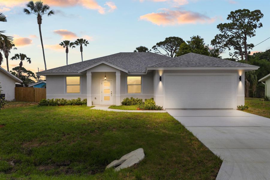 Front exterior of a new home in , Fort Pierce, FL, highlighting curb appeal (Image 15). Front exterior of a new home in , Fort Pierce, FL, highlighting curb appeal (Image 15).
