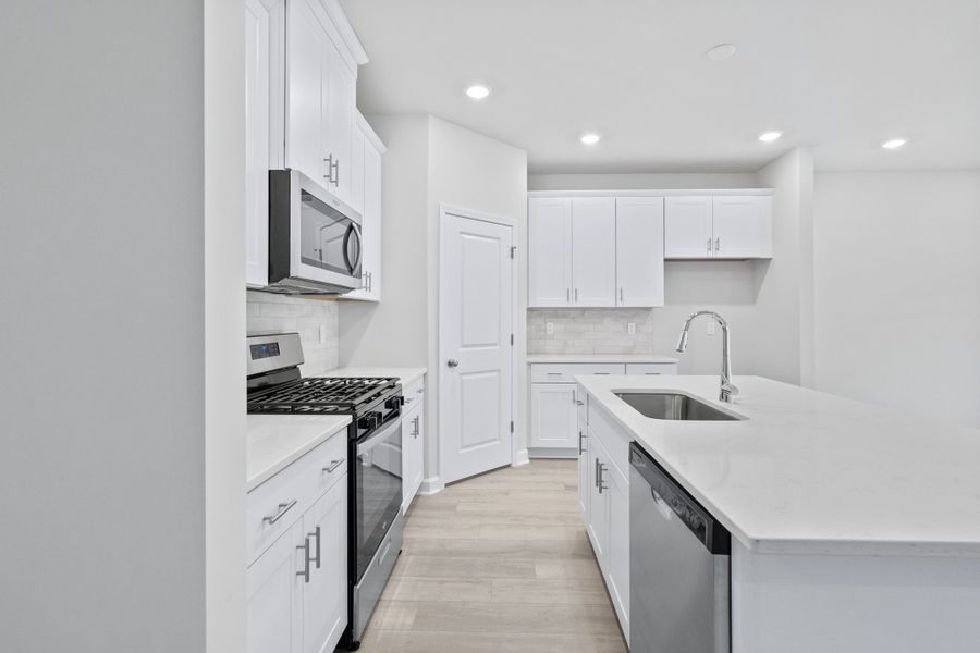 Furnished interior view inside a new home in Waterside - Coastline Series, Longs (Image 6).
