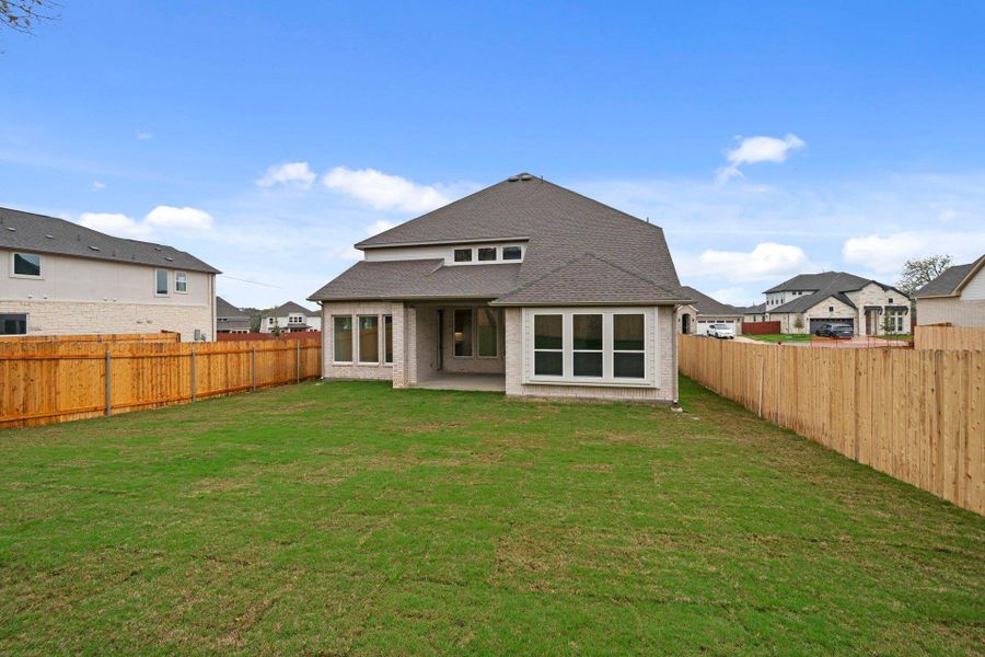 Rear of Home and Private Backyard