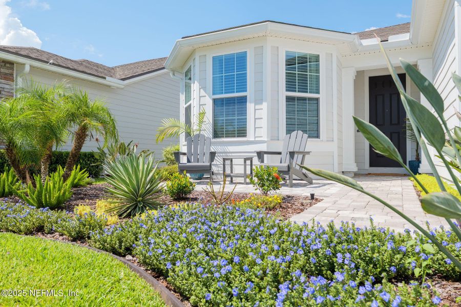 Front exterior of a new home in Del Webb Nocatee, Ponte Vedra, FL, highlighting curb appeal (Image 20).