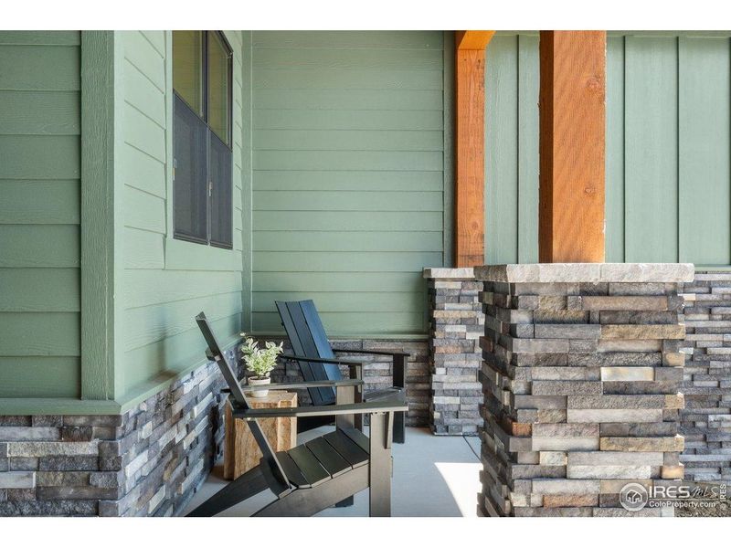 Exterior details and patio area of a home in Harvest Ridge, Berthoud (Image 31).