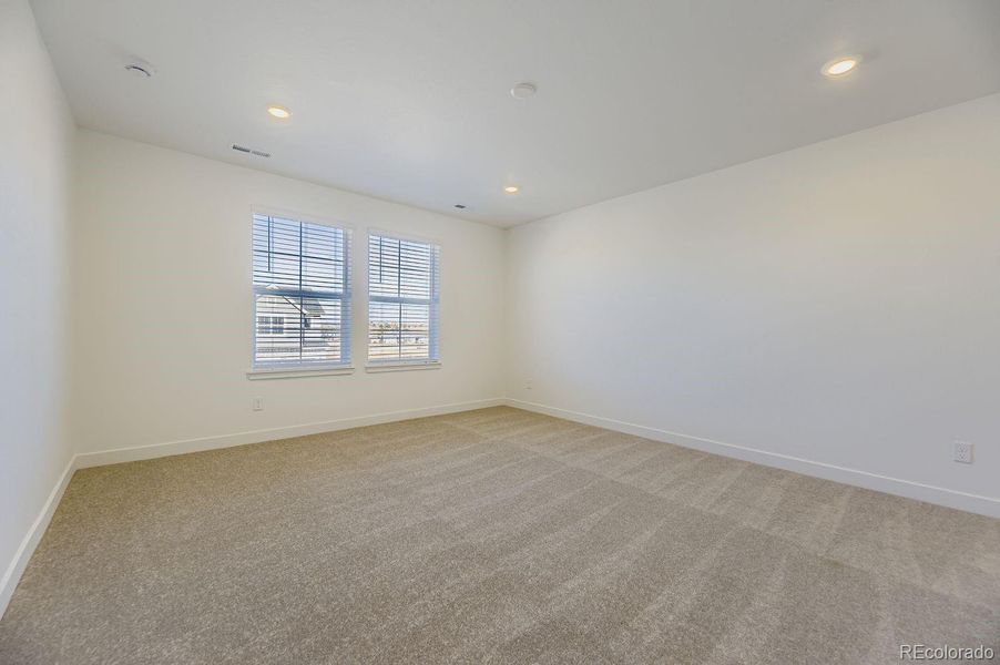 Spacious, unfurnished interior of a new home in Newlin Crossing: The Monarch Collection, Parker (Image 14).