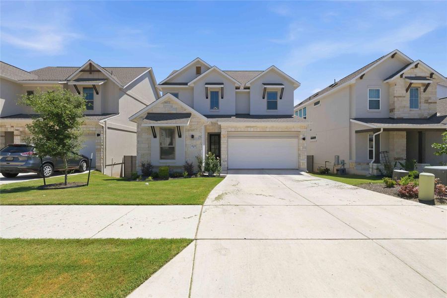 Front exterior of a new home in , Georgetown, TX, highlighting curb appeal (Image 1). Front exterior of a new home in , Georgetown, TX, highlighting curb appeal (Image 1).