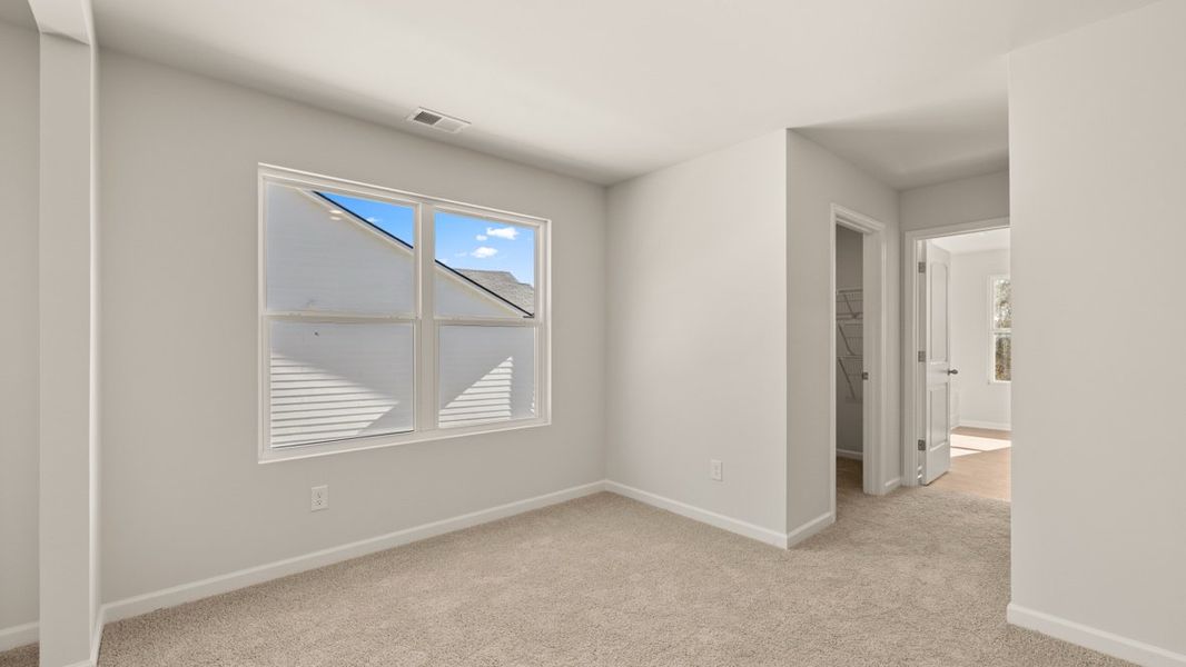 Representative unfurnished interior of a home built from the Halton by D.R. Horton in South Wind, South Fulton (Image 25).