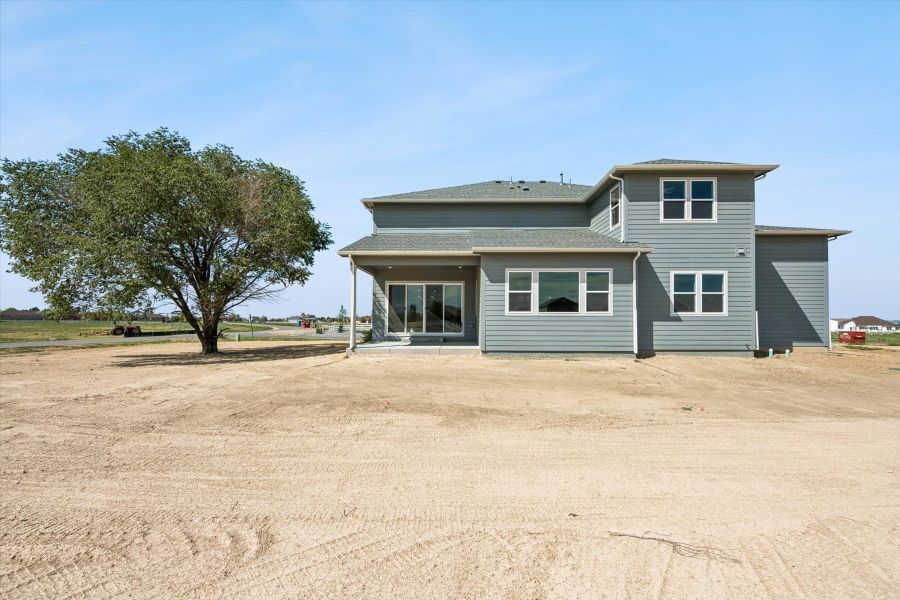Exterior details and patio area of a home in Baseline Lakes – Brighton, Brighton (Image 19).