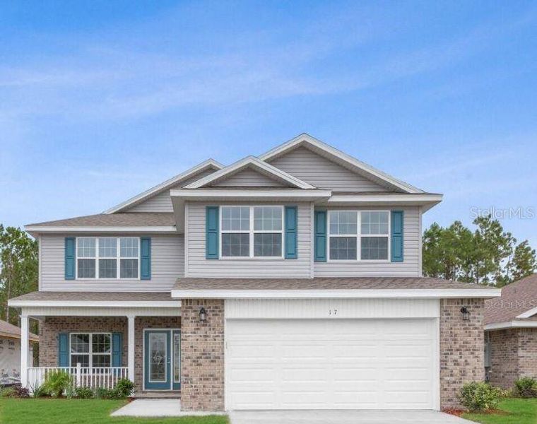 Front exterior of a new home in Palm Coast, Palm Coast, FL, highlighting curb appeal (Image 2). Front exterior of a new home in Palm Coast, Palm Coast, FL, highlighting curb appeal (Image 2).