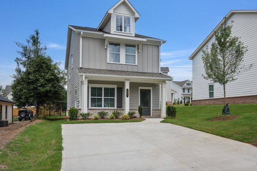 Front exterior of a new home in , Marietta, GA, highlighting curb appeal (Image 19). Front exterior of a new home in , Marietta, GA, highlighting curb appeal (Image 19).