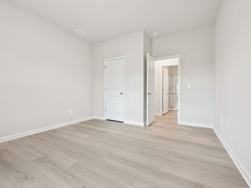 Spacious, unfurnished interior of a new home in Oak Manor - Classic Series, Garner (Image 10). Spacious, unfurnished interior of a new home in Oak Manor - Classic Series, Garner (Image 10).