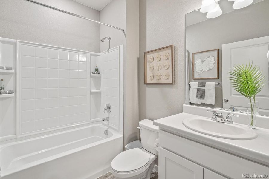 Furnished interior view inside a new home in Trails at Crowfoot, Parker (Image 9).