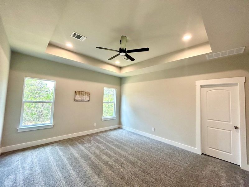 Recessed lighting in the primary bedroom. Recessed lighting in the primary bedroom.