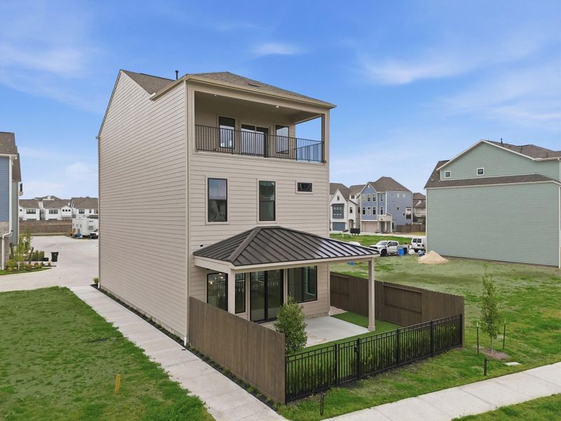 Home is being built Sheetrock will go in soon, still time to pick selections. Home will have back patio like the one pictured.